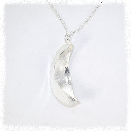 Silver fold form boat pendant